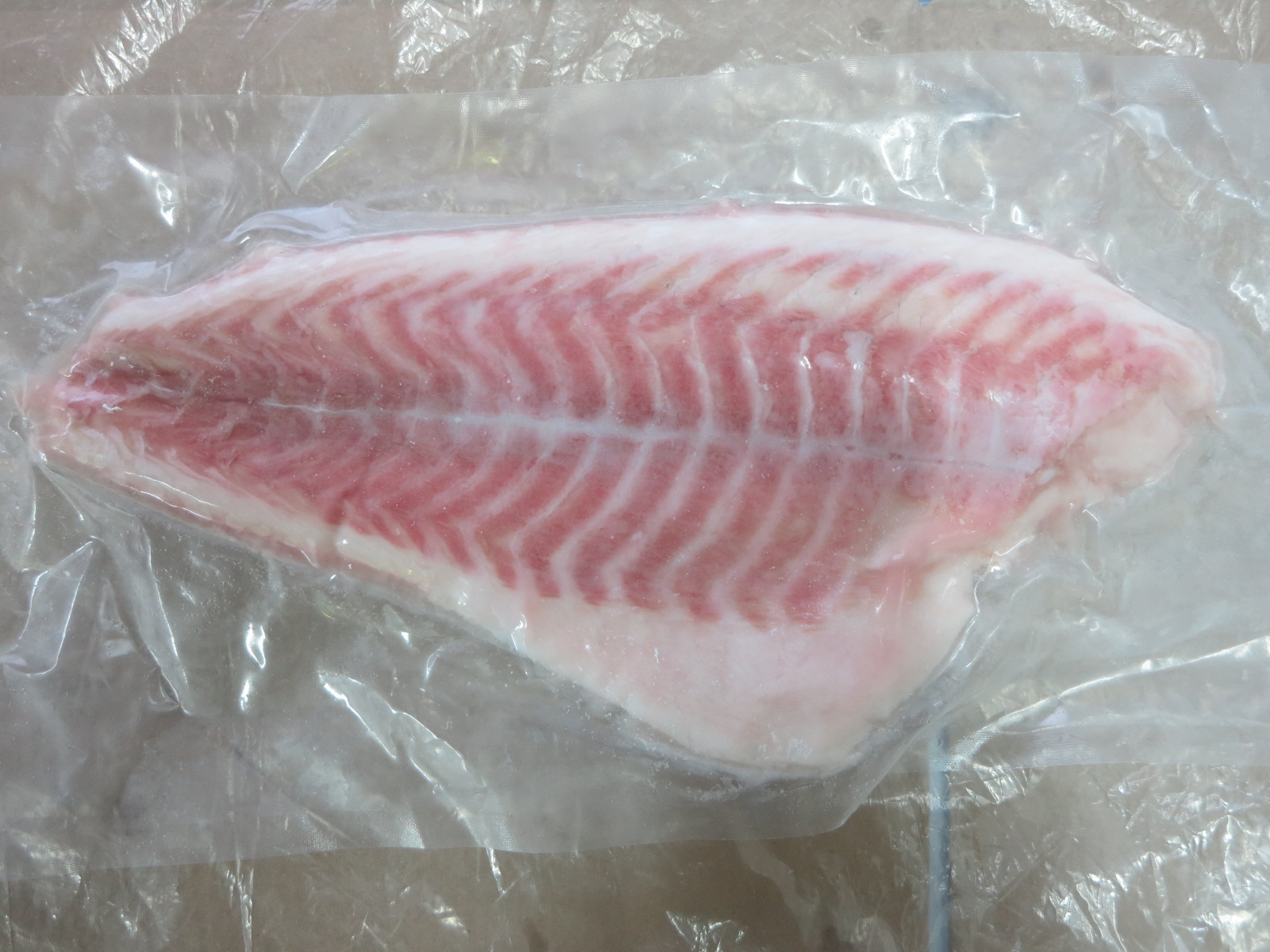 Frozen Red Drum Fish Fillet, boneless, Sciaenops ocellatus, high-quality fatty white flesh